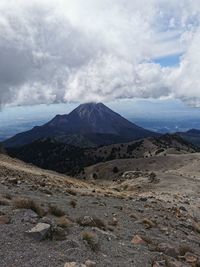 Scenic view of volcanic landscape against sky