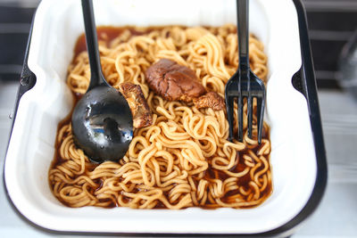 Close-up of noodles served in plate