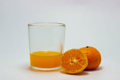 Close-up of drink against white background