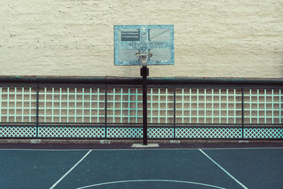 Basketball hoop against building