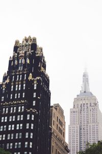 Low angle view of buildings against clear sky