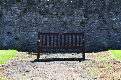 Empty bench in park