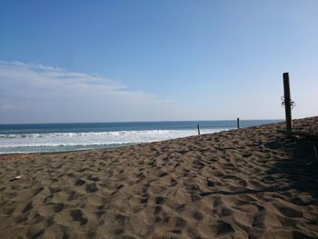 View of beach against clear sky