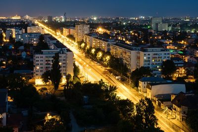 High angle view of light trails on road in city