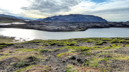 Scenic view of berserkjahraun lava fields against sky