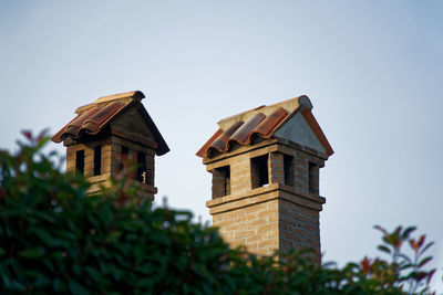 Low angle view of house against clear sky