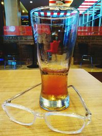 Close-up of beer in glass on table
