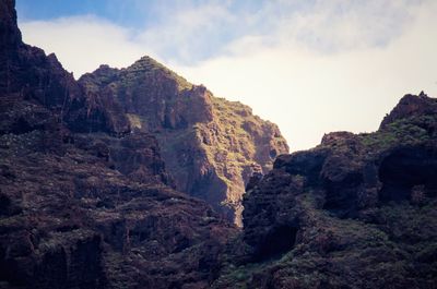 Mountains with sky in background