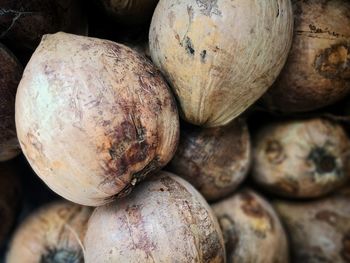 Full frame shot of onions for sale at market stall