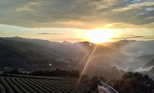 Scenic view of mountains against sky during sunset