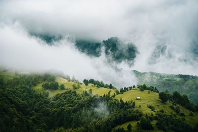 Scenic view of clouds and mountain against sky