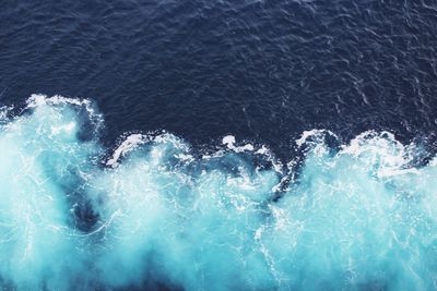 High angle view of water splashing in sea