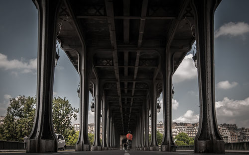 Young man walking on city street