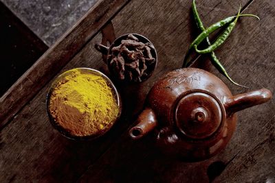 High angle view of old container on table