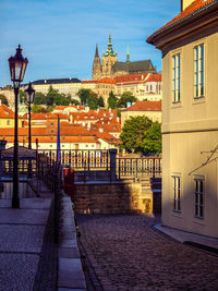 View of street amidst buildings in city