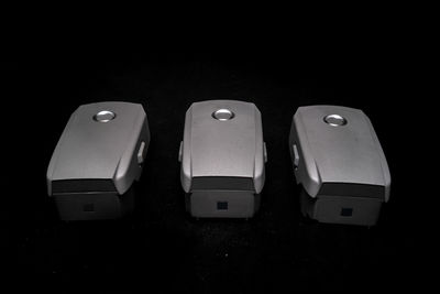 High angle view of telephone on table against black background