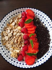 High angle view of fruits in plate on table