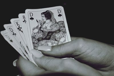 Close-up of person playing guitar