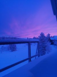 Scenic view of snow against sky during sunset