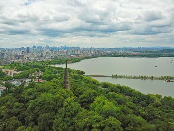 High angle view of trees and buildings against sky