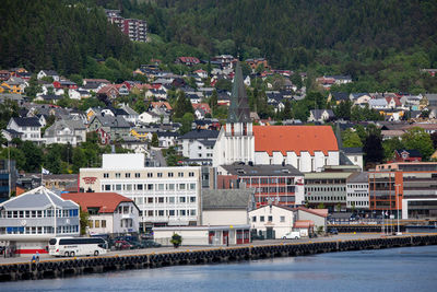 High angle view of townscape by river