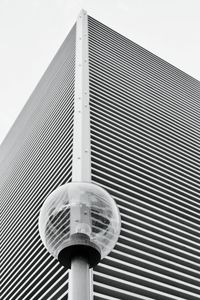 Low angle view of tall building against clear sky