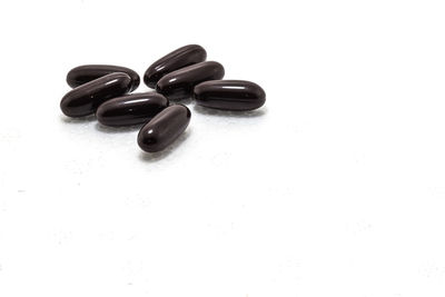 Close-up of cake against white background