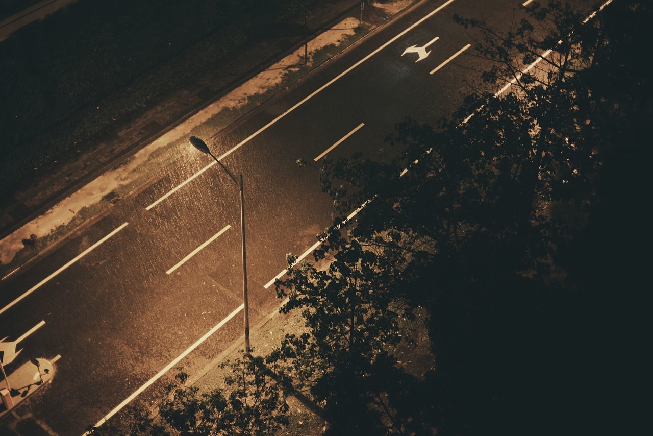 transportation, high angle view, road marking, road, street, mode of transport, land vehicle, night, car, city, on the move, travel, city street, city life, illuminated, street light, outdoors, asphalt, zebra crossing, traffic