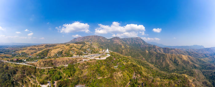 Scenic view of mountains and big white buddha thailand 