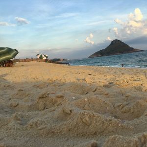 Scenic view of beach against sky