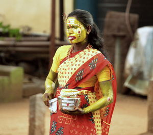 Woman standing during traditional festival