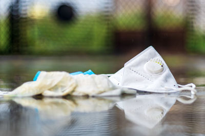 Close-up of white water on table