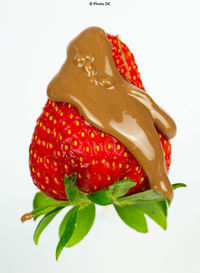 Close-up of strawberry against white background