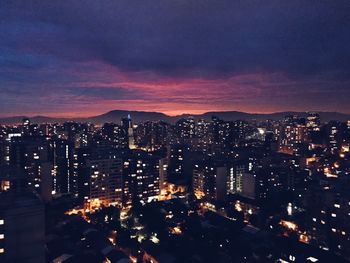 Illuminated cityscape at night