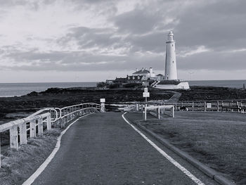 Lighthouse against cloudscape 