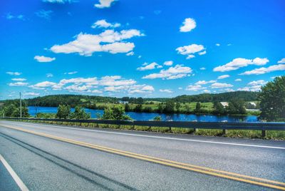 Road against cloudy sky