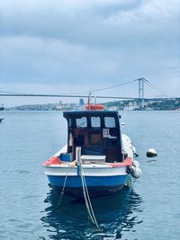 Nautical vessel on sea against sky