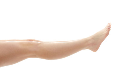 Close-up of hands against white background