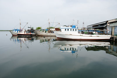 Boats moored in harbor