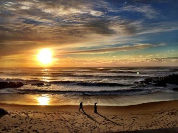 Scenic view of sea at sunset