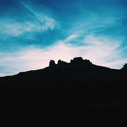 Silhouette of mountain against sky