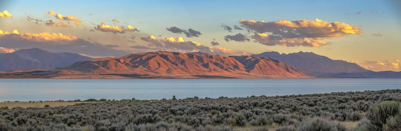 Scenic view of mountains against sky during sunset