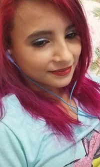 Close-up portrait of smiling young woman