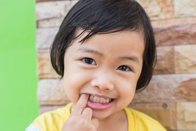 Close-up portrait of smiling boy