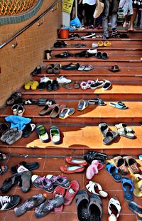 Low section of man sitting in row