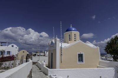 Santorini, greece, may 5, 2024. oia. traditional orthodox church with blue dome