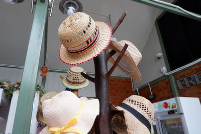 Low angle view of hat hanging on display at store