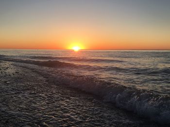 Scenic view of sea at sunset