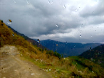 View of water against cloudy sky