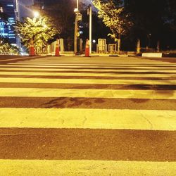Zebra crossing on street at night